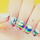 Illustration for article titled Lady Rainicorn does Lady Rainicorn nails